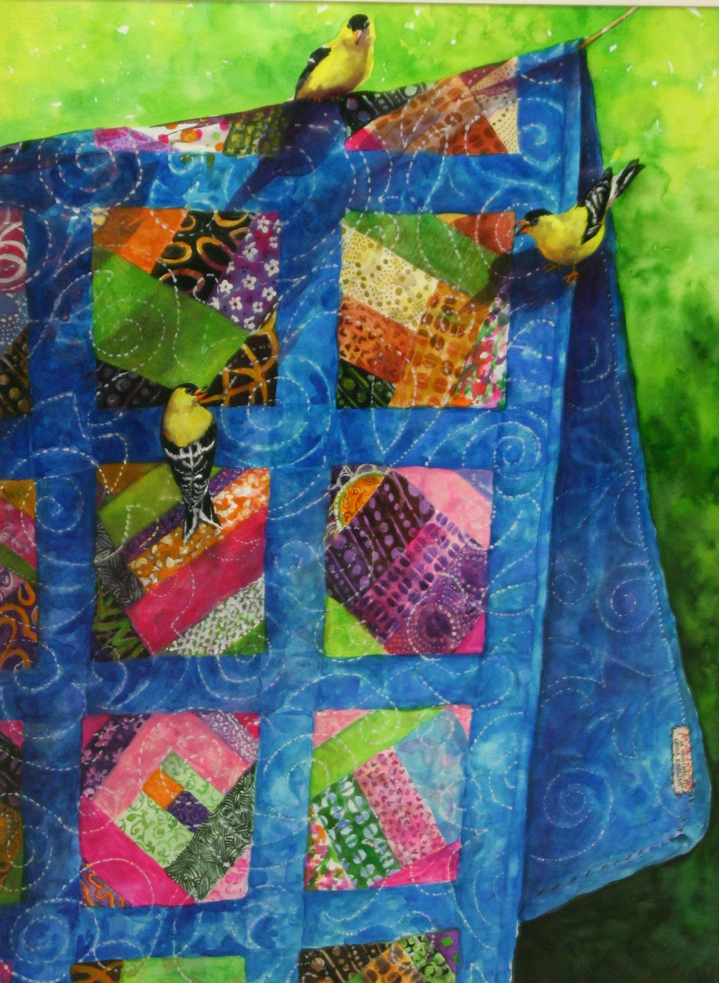 Colorful quilt with bird illustrations on a green background