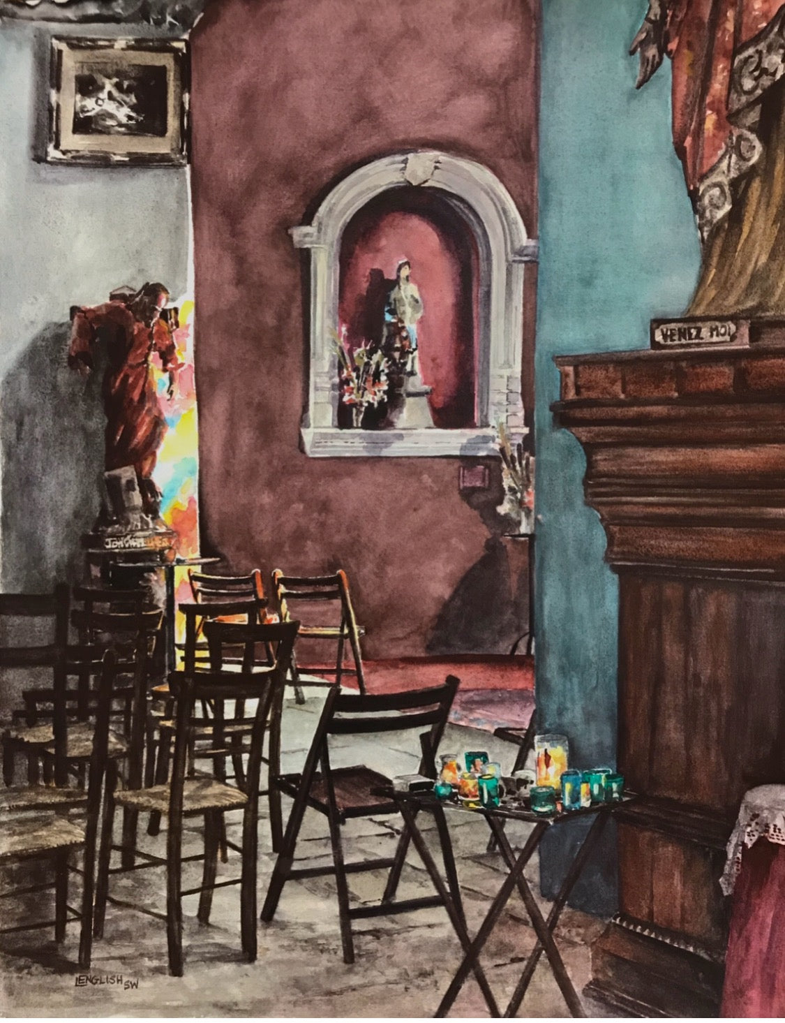 Colorful interior scene with chairs, a table, and religious iconography.