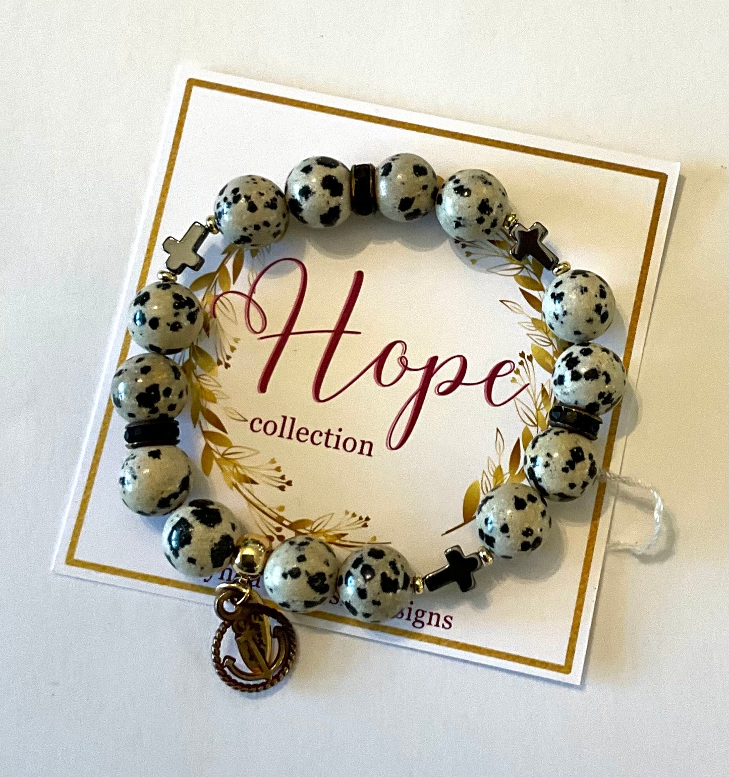 Bracelet with dalmatian Jasper stones on a 'Hope collection' card