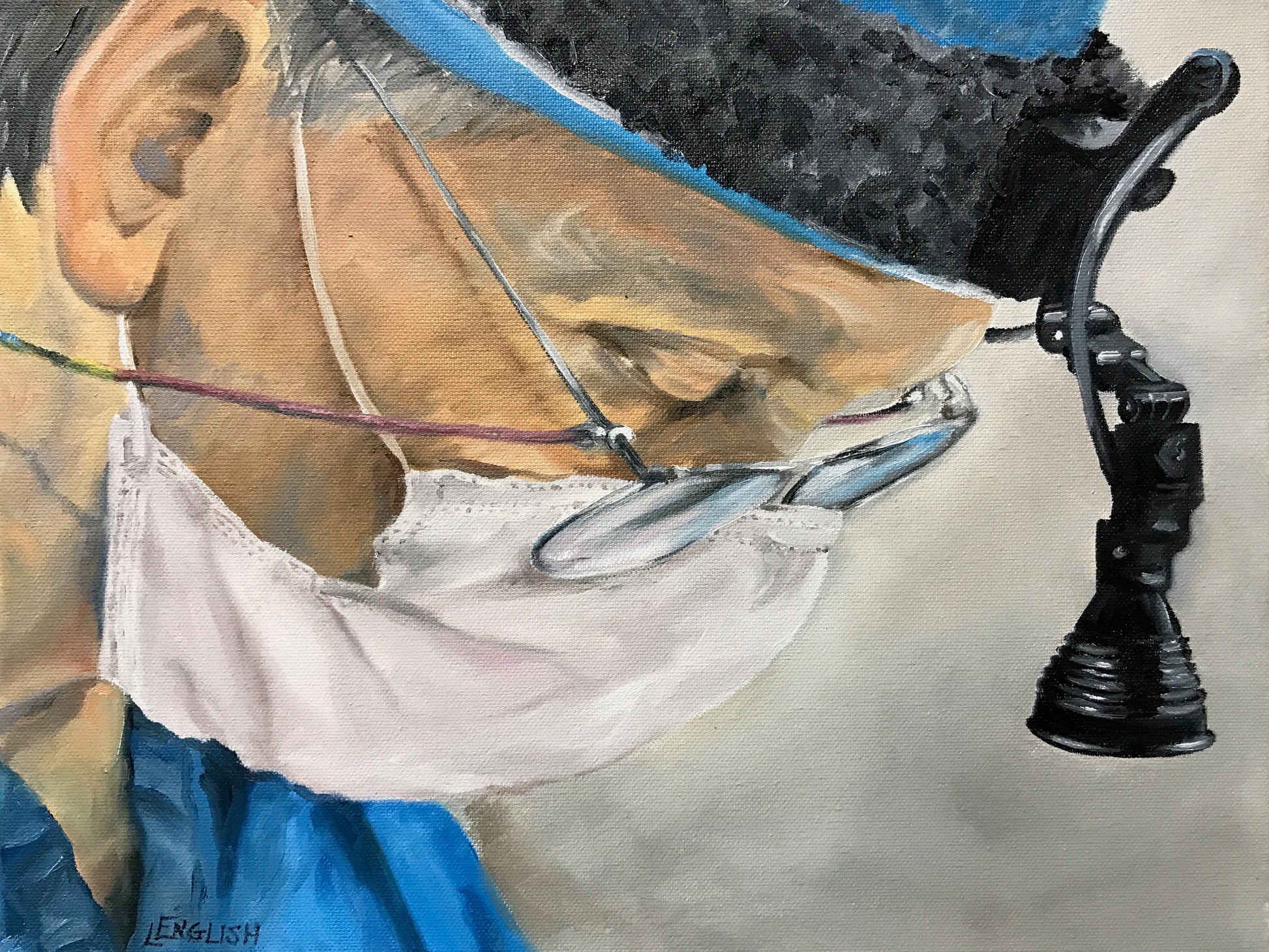 Close-up of a horse's head wearing a face mask with a watercolor background